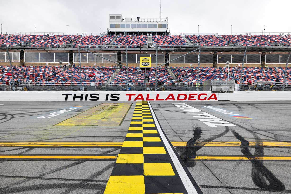 Fans celebrating after a NASCAR race at Talladega Superspeedway.