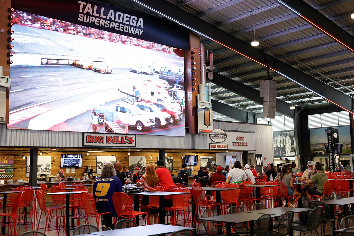 Fans gathered inside Big Bill's at Talladega Superspeedway with a large video screen above the seating area